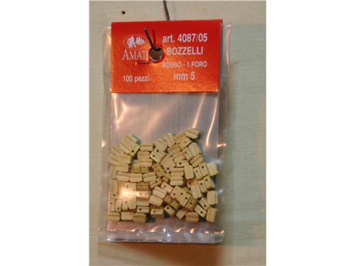 Bozzelli in legno  bosso - 1 foro mm.5 - art. 4087/05 - Amati